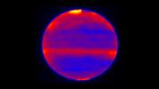 PIA22774: Jupiter Poles: Hot from Solar Wind