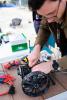 PIA23794: NASA Scientist Works on an A-PUFFER Robot During Trials
