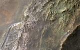 PIA24861: Colorful Layers in a Crater Wall