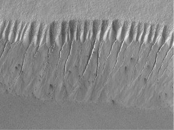 PIA01034: Evidence for Recent Liquid Water on Mars: Gullies at 70°S in Polar Pit Walls