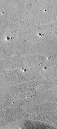 PIA02341: Possible Rootless Cones or Pseudo craters on Mars