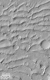PIA02359: Ancient Paleo-Dunes Battered by Impact Craters