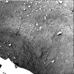 PIA10752: Scoopful of Martian Soil After Release