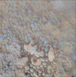 PIA12970: Coating on Rock Beside a Young Martian Crater