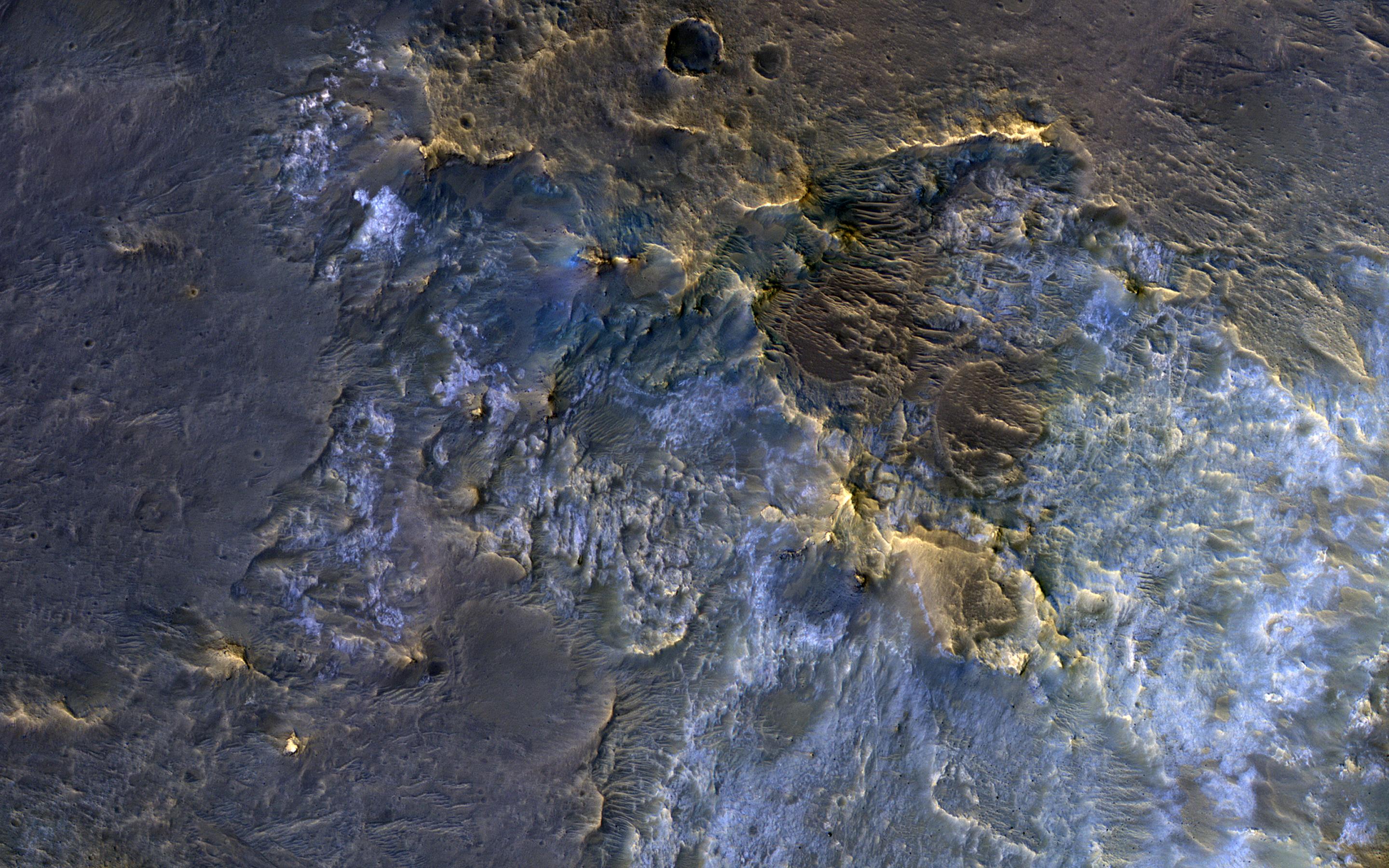 PIA23057: Exposing the Rock in Impact Craters