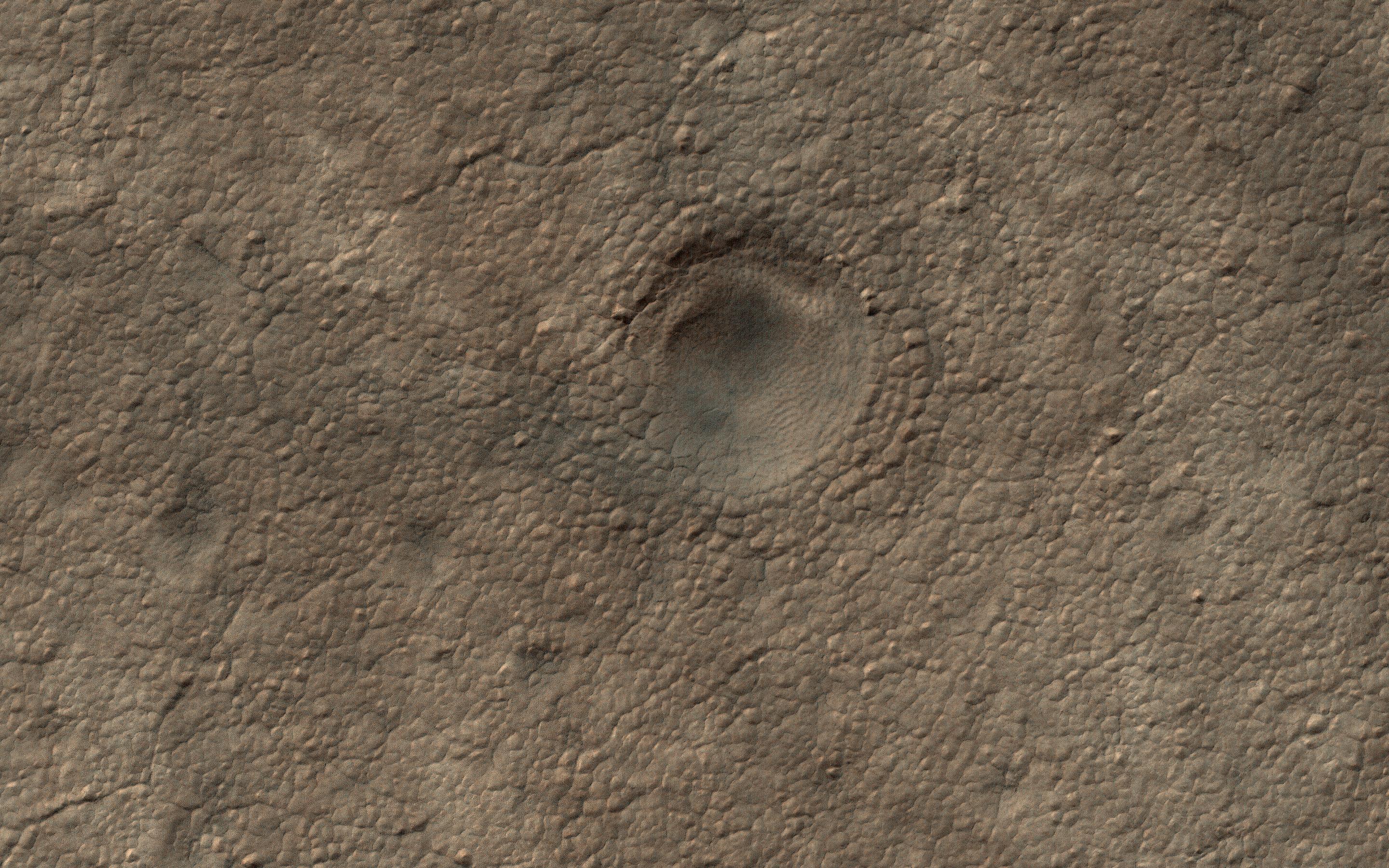 PIA23106: A Crater on the South Polar Layered Deposits