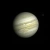 PIA00235: Jupiter with Satellite Io